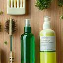 Eco-friendly cleaning products arranged on a wooden table