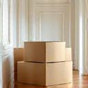 Moving boxes in a shiny, clean hallway